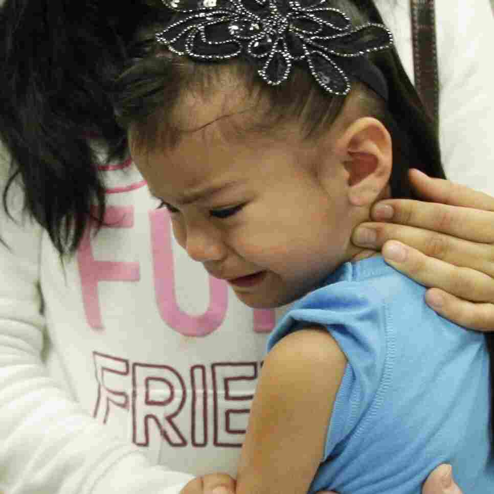 Kimberly Magdeleno, 4, braces herself for a whooping cough booster shot at a health clinic in Tacoma, Wash., in May. Kimberly Magdeleno, 4, braces herself for a whooping cough booster shot at a health clinic in Tacoma, Wash., in May.