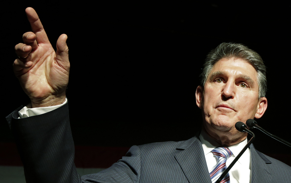 Sen. Joe Manchin, a West Virginia Democrat, has an "A" rating from the NRA, but questions why anyone would need the kind of semi-automatic assault rifle used in the Newtown, Conn., killings. (Dave Martin/AP)