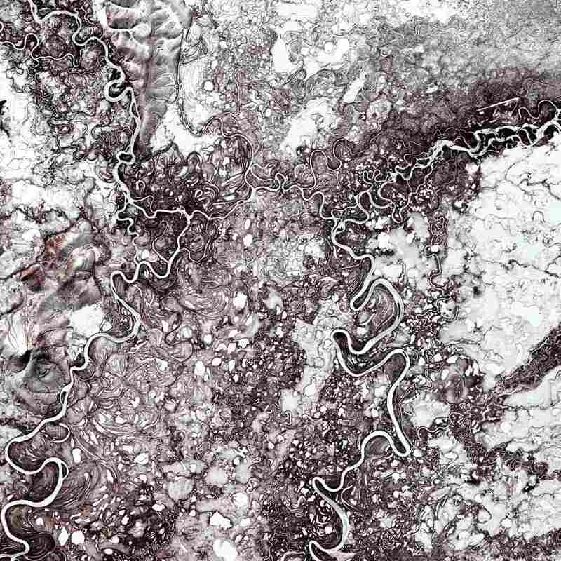 Mayn River, Russia, 2000The Mayn River is a tributary of the larger Anadyr River, which flows through the far northeastern corner of Siberia. While these rivers are frozen for about eight to nine months in a year, they are home to chum and sockeye salmon during the summer months.