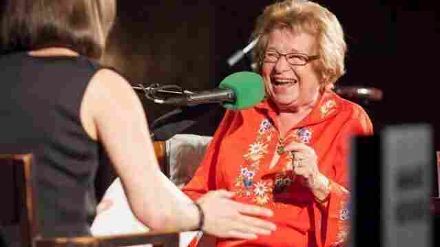 Host Ophira Eisenberg chats with this week's Ask Me Another Very Important Puzzler, Dr. Ruth Westheimer, on stage at The Bell House in Brooklyn, N.Y.