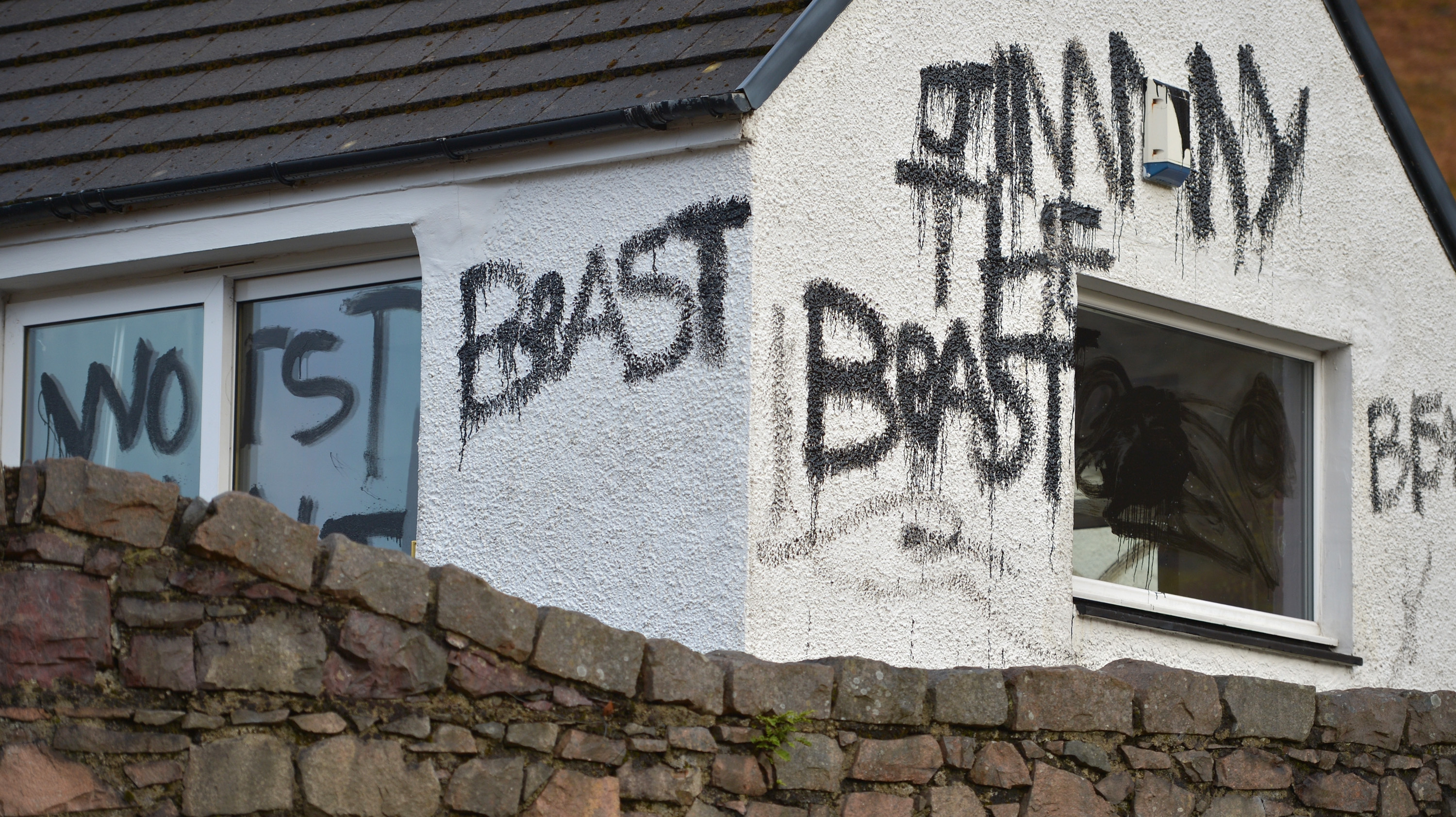 After accusations of sexual abuse against late TV personality Jimmy Savile became public last October, messages were spray-painted on his Scottish cottage, calling him a &quot;beast.&quot; Police say the house was one of &quot;the main premises&quot; where the abuses took place. (Getty Images)