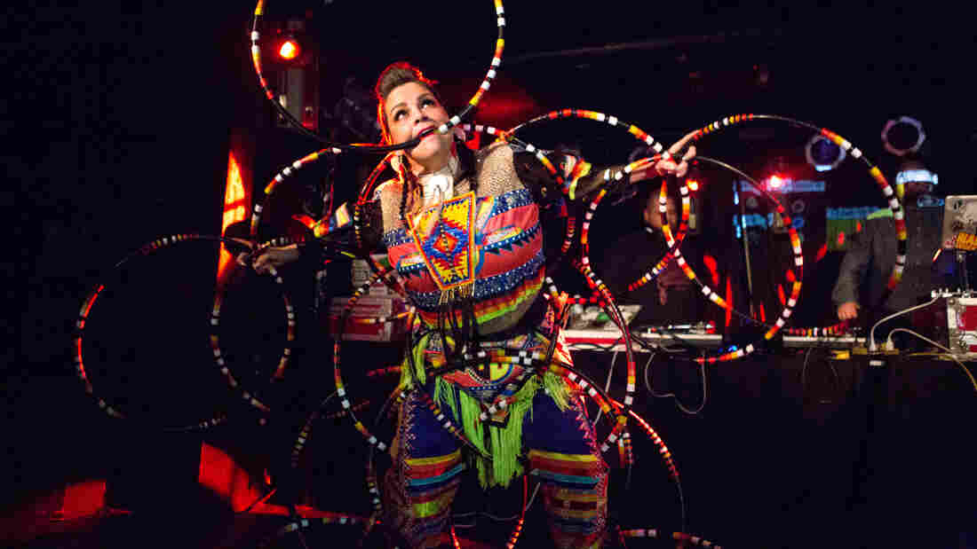 A hooper dances to Canadian electronic group A Tribe Called Red at globalFEST 2013.