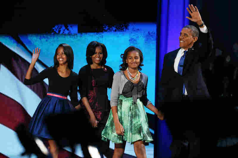 First family: Obama walks on stage with his family to deliver his victory speech on election night on Nov. 6, 2012, in Chicago.