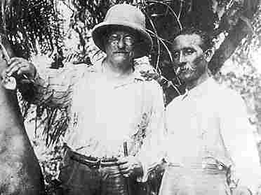 Teddy Roosevelt stands between a bush deer and Brazilian explorer Candido Rondon in a photograph taken before their party reached the River of Doubt. (Theodore Roosevelt Collection, Harvard College Library)