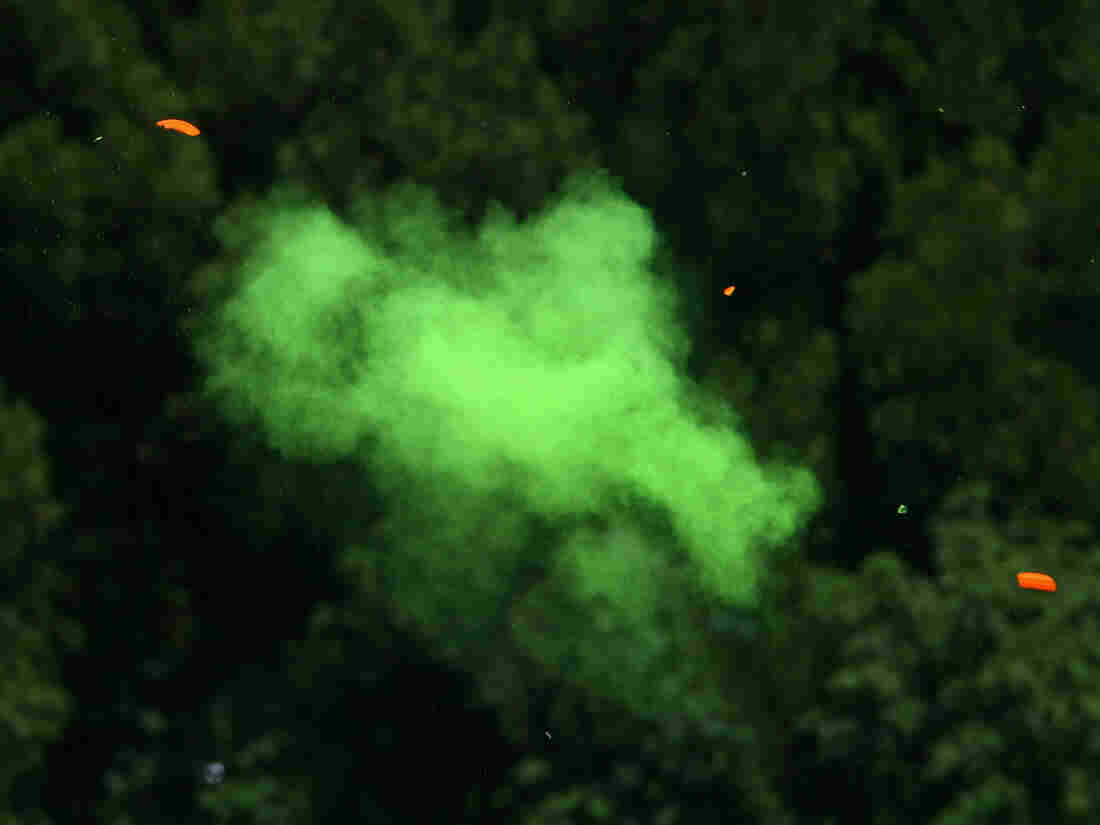 A clay target shatters during the 2008 Beijing Olympics.