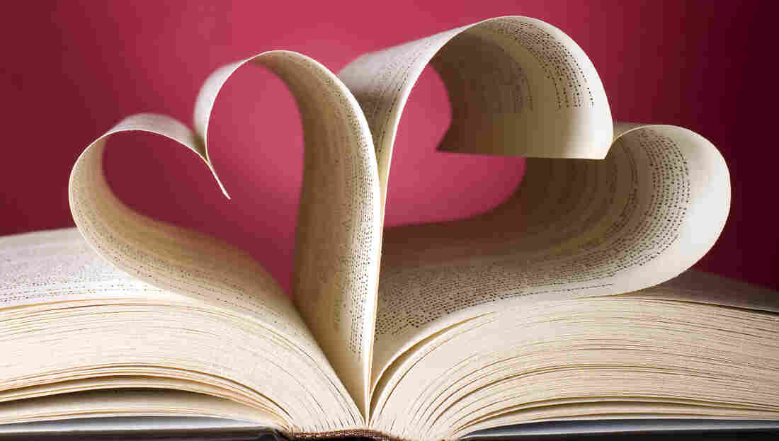 Book with opened pages and shape of heart