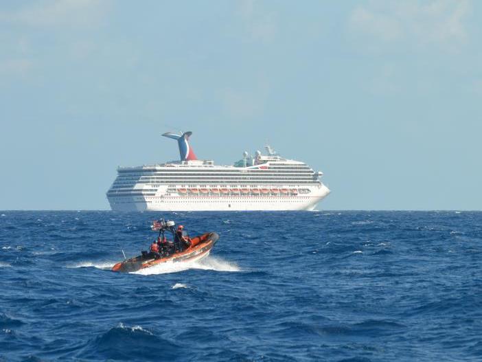 The Triumph cruise ship, set adrift in the Gulf of Mexico after an engine room fire Sunday, is being towed to Mobile, Alabama. The Carnival cruise ship line has cancelled the ship's next 14 voyages. (U.S. Coast Guard)