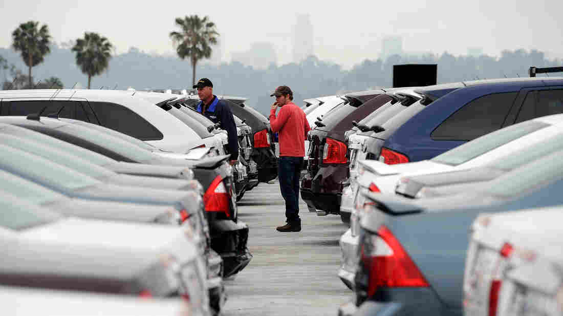 Allen Zimney shops for a Ford Edge at the Star Ford dealership, with the help of Star Ford salesman Greg Bowles, on March 23, 2012 in Glendale, Calif.
