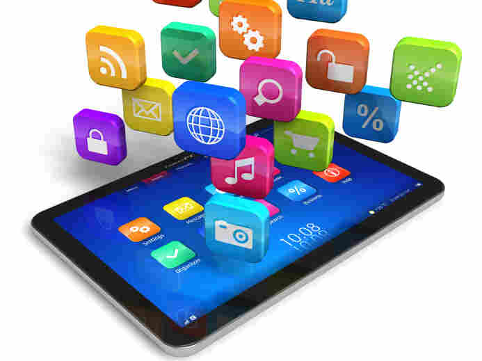 Tablet PC with cloud of colorful apps