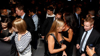 Scientists say that understanding how the cocktail party effect works could help people who have trouble deciphering sounds in a noisy environment. Guests make it look easy at a Dolce and Gabbana Lounge party in London in 2010.