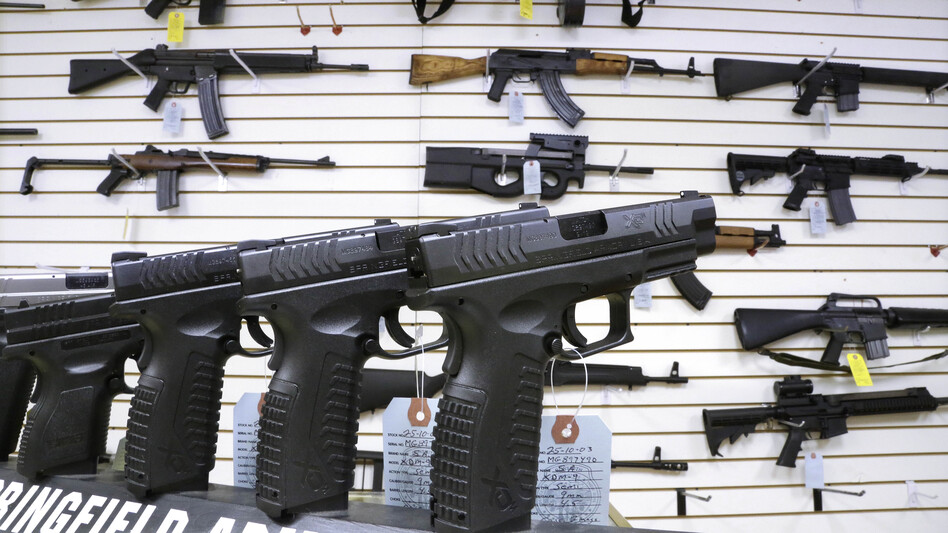 Assault weapons and handguns for sale at Capitol City Arms Supply in Springfield, Ill., on Jan. 16. Congress has yet to vote on legislative efforts to enact new gun control laws, nearly four months after the Newtown, Conn., school shootings. (Seth Perlman/AP)