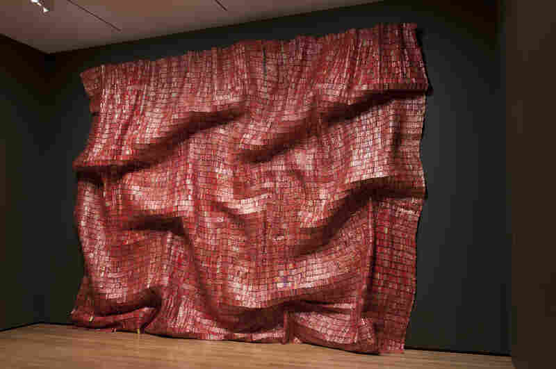 El Anatsui's Red Block (2010) explores the monumentality of a single color, suggestive of paintings by Mark Rothko or Gerhard Richter.