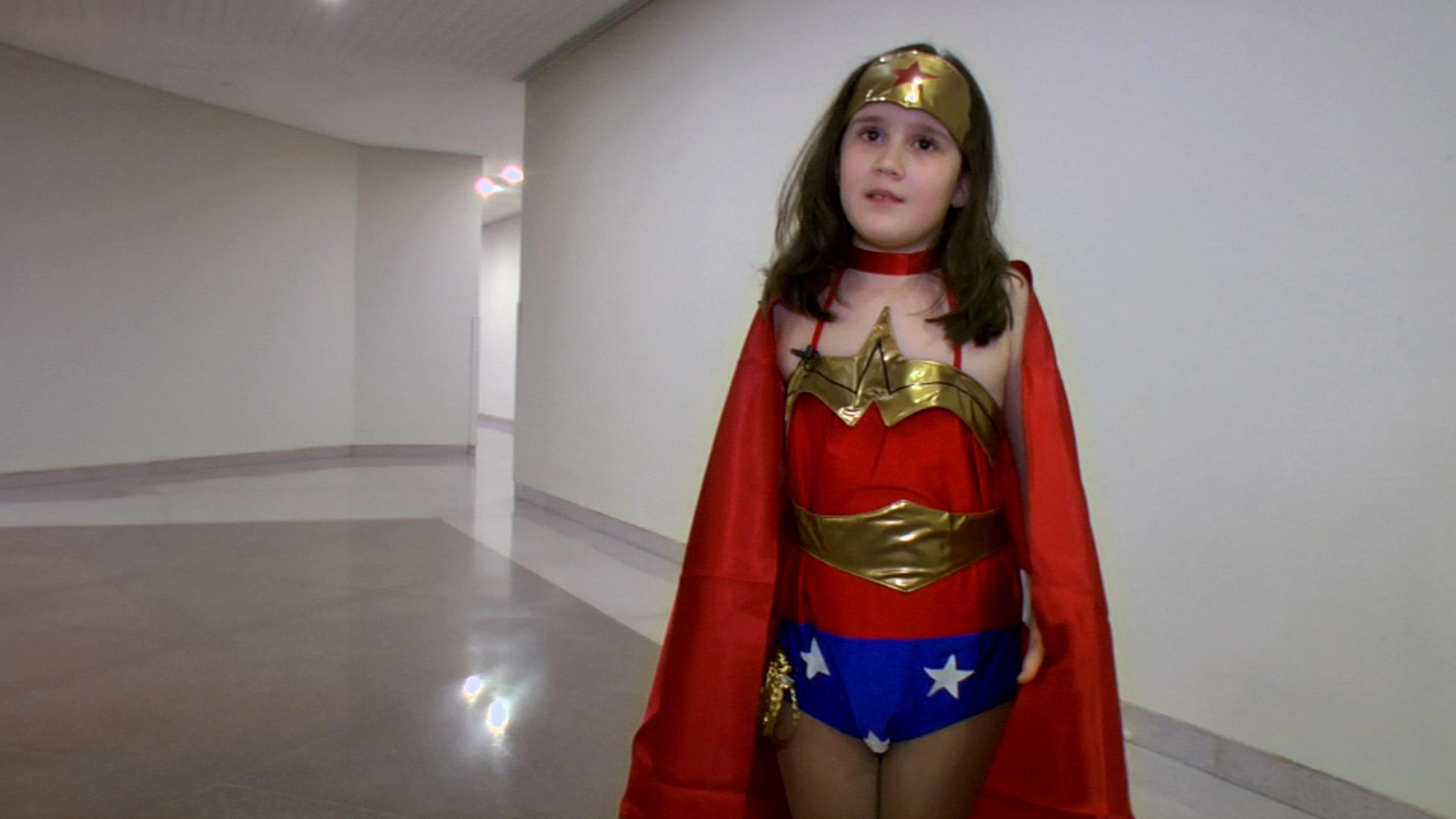 Katie, who's nine years old, explains her love of Wonder Woman in a new documentary. (Vaquera Productions)