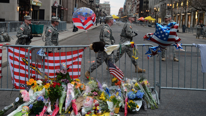 Flowers, flags and balloons at a memorial in Boston near the site of Monday's explosions. (Wang Lei/Xinhua /Landov)
