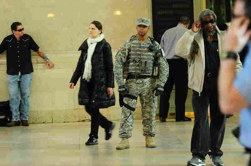 A U.S. soldier patrols at Grand Central station in New York on Tuesday. Safety concerns led to stepped-up security at public places and events after the bombings in Boston.
