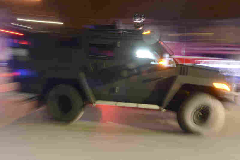 An armored vehicle is driven near Mount Auburn and Melendy streets in Watertown.