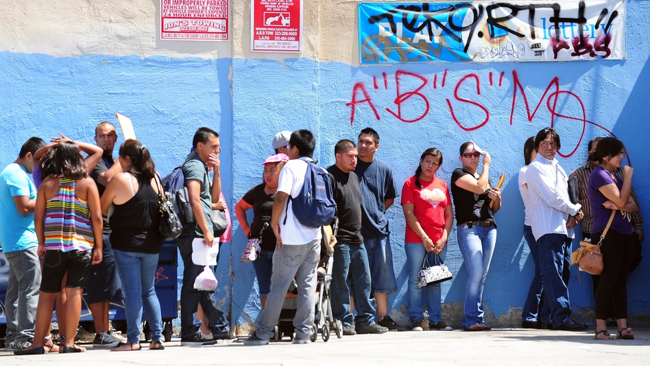 Young people wait in line to enter the Coalition for Humane Immigrant Rights of Los Angeles office on the first day of the Deferred Action for Childhood Arrivals program in August. (Frederic J. Brown/AFP/Getty Images)