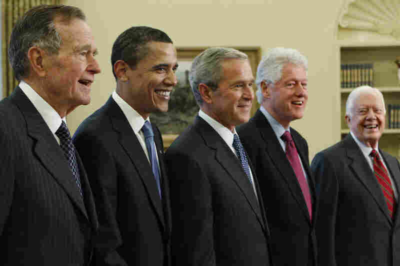 President George W. Bush, center, with President-elect Barack Obama, and former presidents, from left, George H.W. Bush, left, Bill Clinton and Jimmy Carter, right, Wednesday, Jan. 7, 2009, in the Oval Office of the White House in Washington.