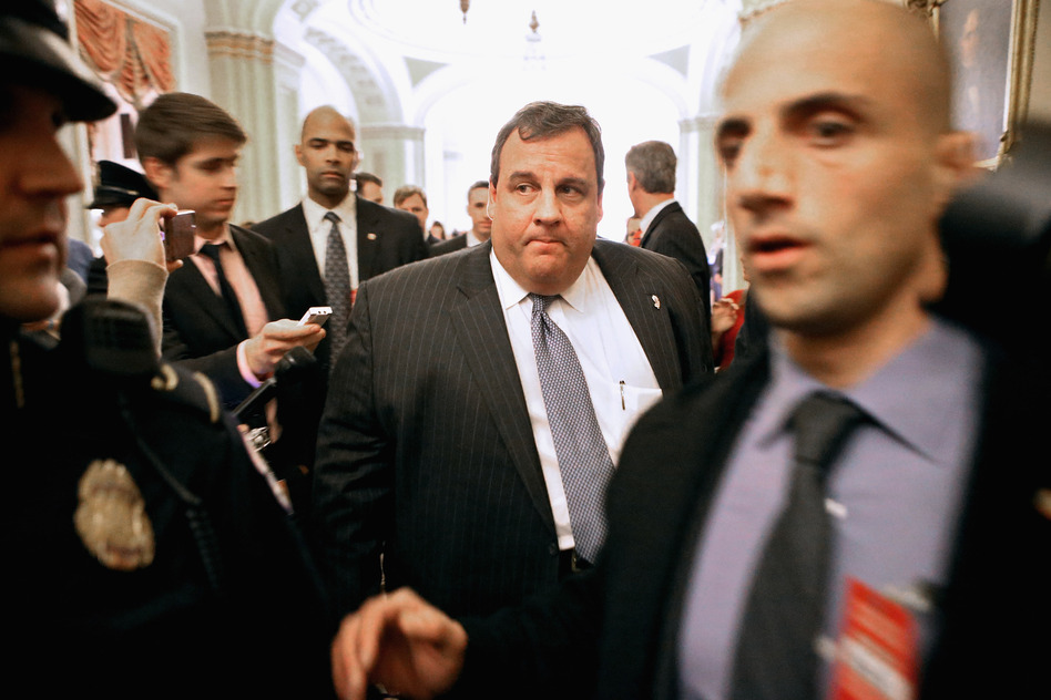 New Jersey Gov. Chris Christie is surrounded by security and journalists in 2012. (Chip Somodevilla/Getty Images)