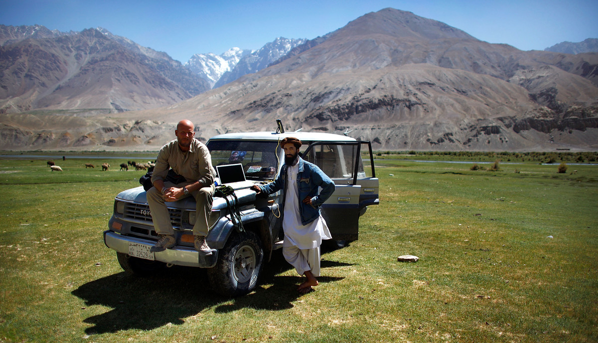 NPR photographer David Gilkey and translator Atiqullah "Ihrar" cover the presidential voting day in northern Afghanistan.