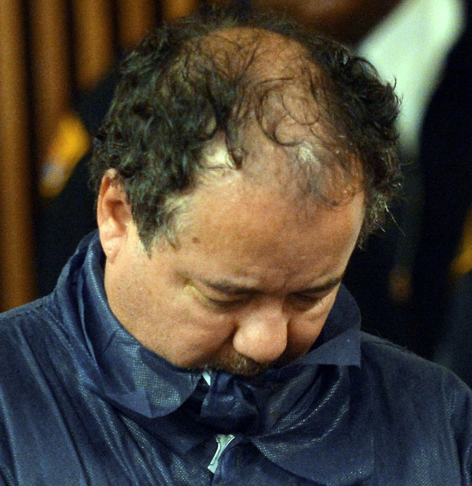 Ariel Castro during his arraignment Thursday at Cleveland Municipal Court. He's accused of kidnapping and raping three young women, and then holding a daughter born to one of those women captive. The women had been missing for about a decade. The child is now six years old. (Emmanuel Dunand /AFP/Getty Images)