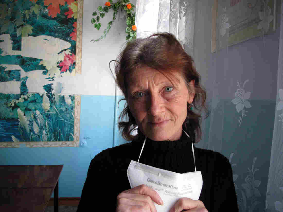 Maria Smolnitcaia, 52, is a singer living on a TB ward in Balti, Moldova. Smolnitcaia says "When we take the pills, we feel worse. I'm losing my hearing a little. I feel pain in my bones, in my whole body."