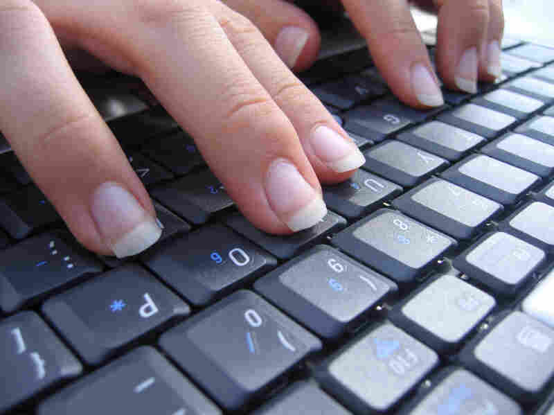 Typing hands.