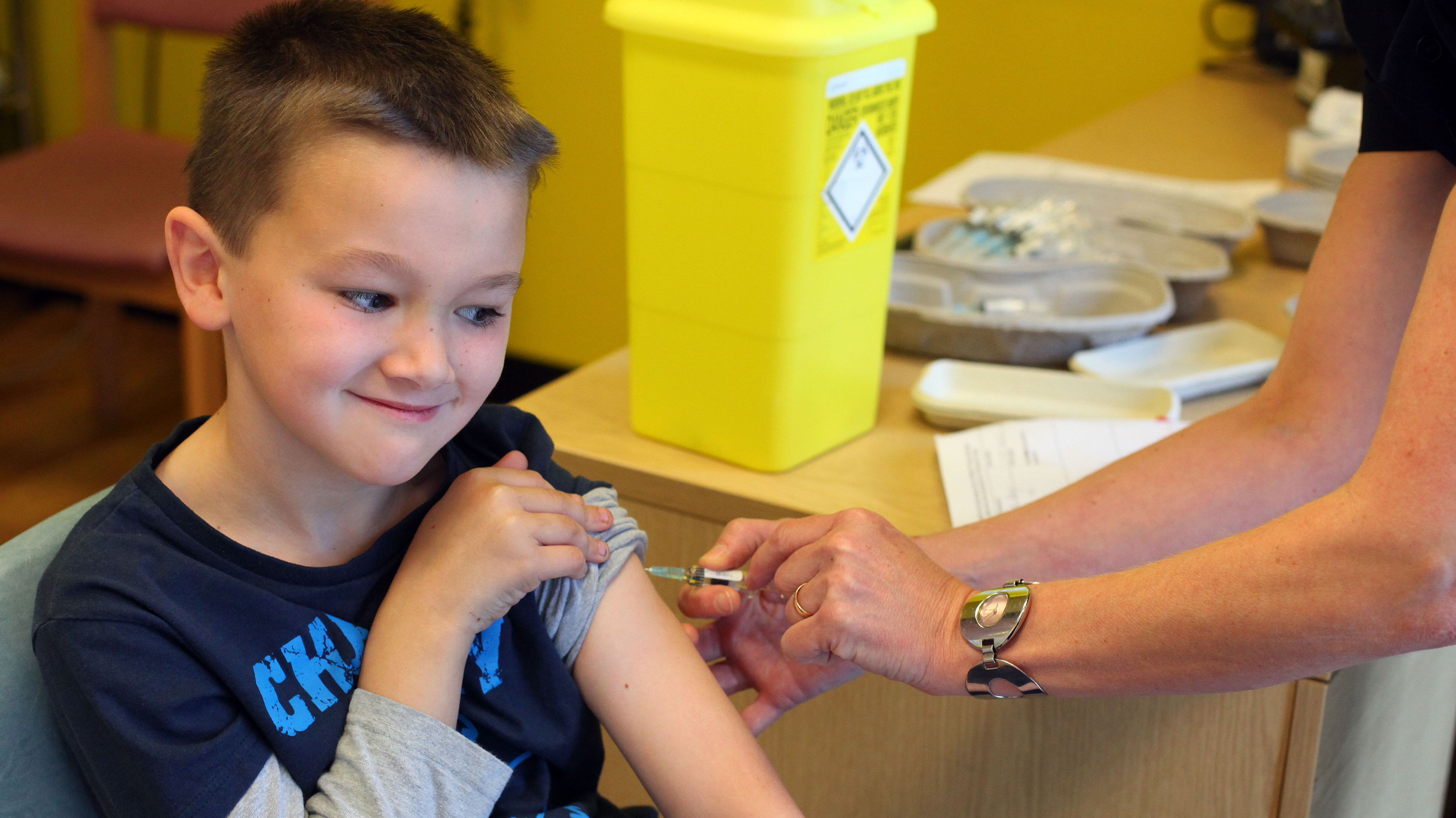 Luke Tanner, 7, gets vaccinated for measles at a clinic near Swansea, Wales, in April. Wales is at the center of a measles outbreak that has been linked to one death. (AFP/Getty Images)