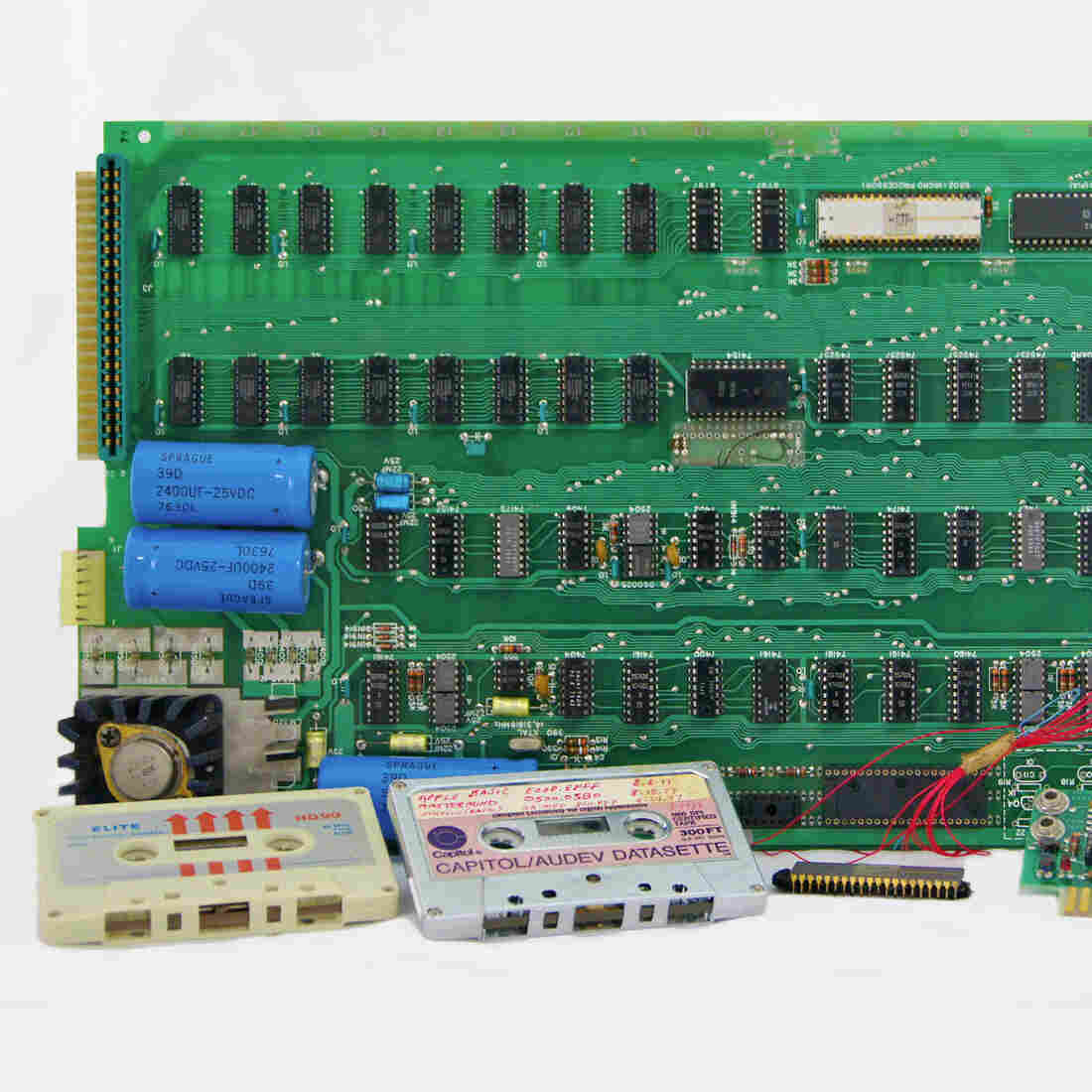 With the exception of one cassette connector, this is the Apple-1 as it was delivered to Fred Hatfield. The user was responsible for finding a monitor and keyboard for the early computer that recently sold at auction for $671,000. With the exception of one cassette connector, this is the Apple-1 as it was delivered to Fred Hatfield. The user was responsible for finding a monitor and keyboard for the early computer that recently sold at auction for $671,000.