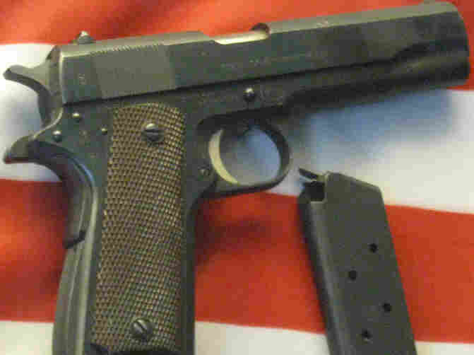 Handgun on flag.