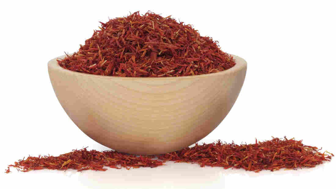 Saffron is a stringy red spice made from the dried stigma of a saffron flower.