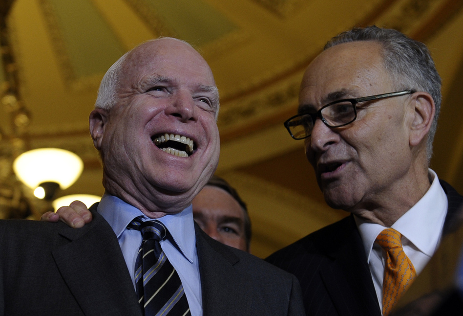 Sens. John McCain, R-Ariz., and Charles Schumer, D-N.Y., shared the pleasure that came with the Senate passing its immigration bill. The House could soon ruin their happiness. (Susan Walsh/AP)