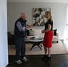 Real estate agent Katie Hayes (right) answers questions about a home for sale during an open house in San Francisco in May. With the median home price now in excess of $1 million, many longtime residents feel squeezed out. Real estate agent Katie Hayes (right) answers questions about a home for sale during an open house in San Francisco in May. With the median home price now in excess of $1 million, many longtime residents feel squeezed out.