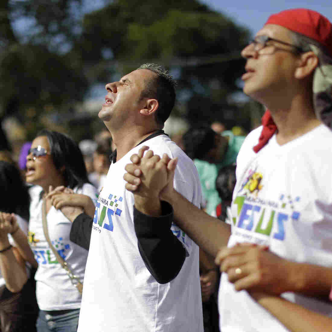 Evangelical Christians pray during the "March for Jesus" in Sao Paulo, Brazil, Saturday, June 29, 2013. Evangelical Christians pray during the "March for Jesus" in Sao Paulo, Brazil, Saturday, June 29, 2013.