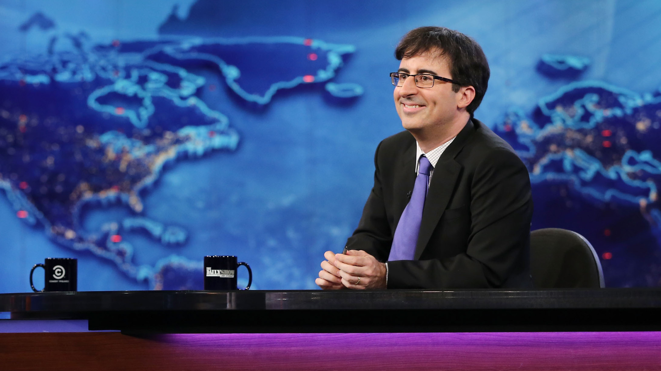 John Oliver is filling in as the summer guest host of <em>The Daily Show</em>. His own stand-up show on Comedy Central is returning for a fourth season. (Getty Images)