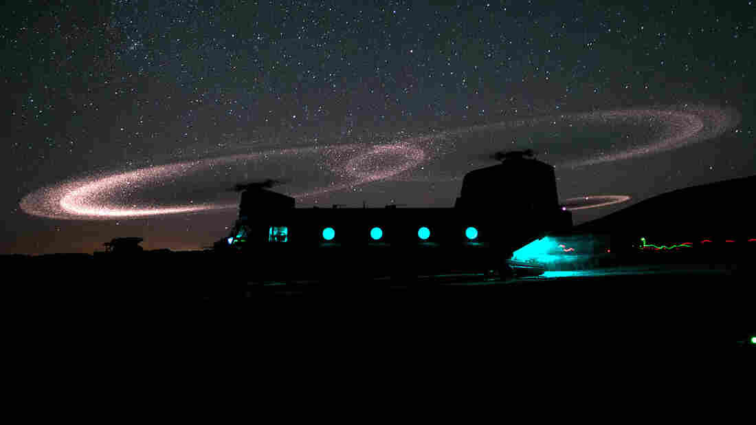 Dust lights up the rotors of a CH-47 Chinook helicopter as paratroopers with 3rd Squadron, 73rd Cavalry Regiment load for an air assault mission near Combat Outpost Ab Band, May 23, 2012, Ghazni province, Afghanistan.