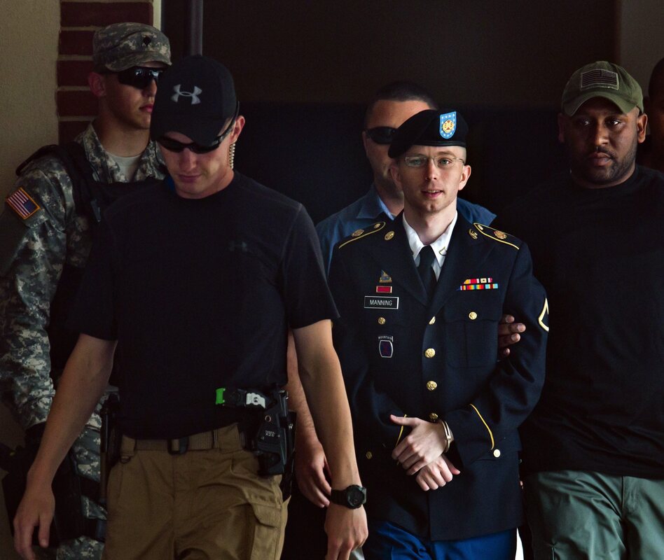 Army Private Bradley Manning, center, leaves the courtroom at Fort Meade, Maryland, on Tuesday. (Jim Lo Scalzo/EPA /Landov)