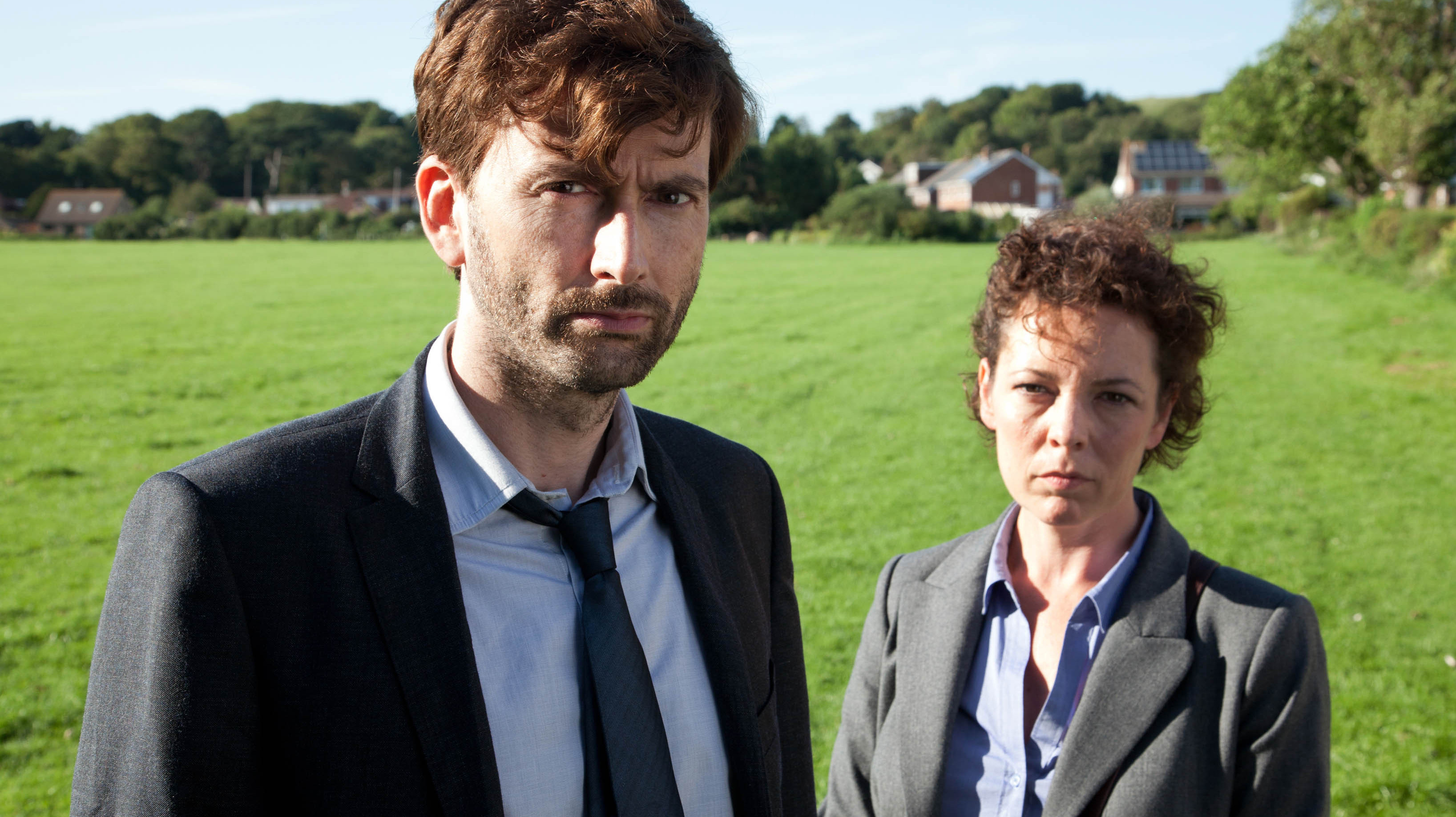 David Tennant plays Detective Inspector Alec Hardy alongside Olivia Colman as Detective Sergeant Ellie Miller, investigating the murder of a young boy in the BBC crime drama <em>Broadchurch</em>. (BBC)