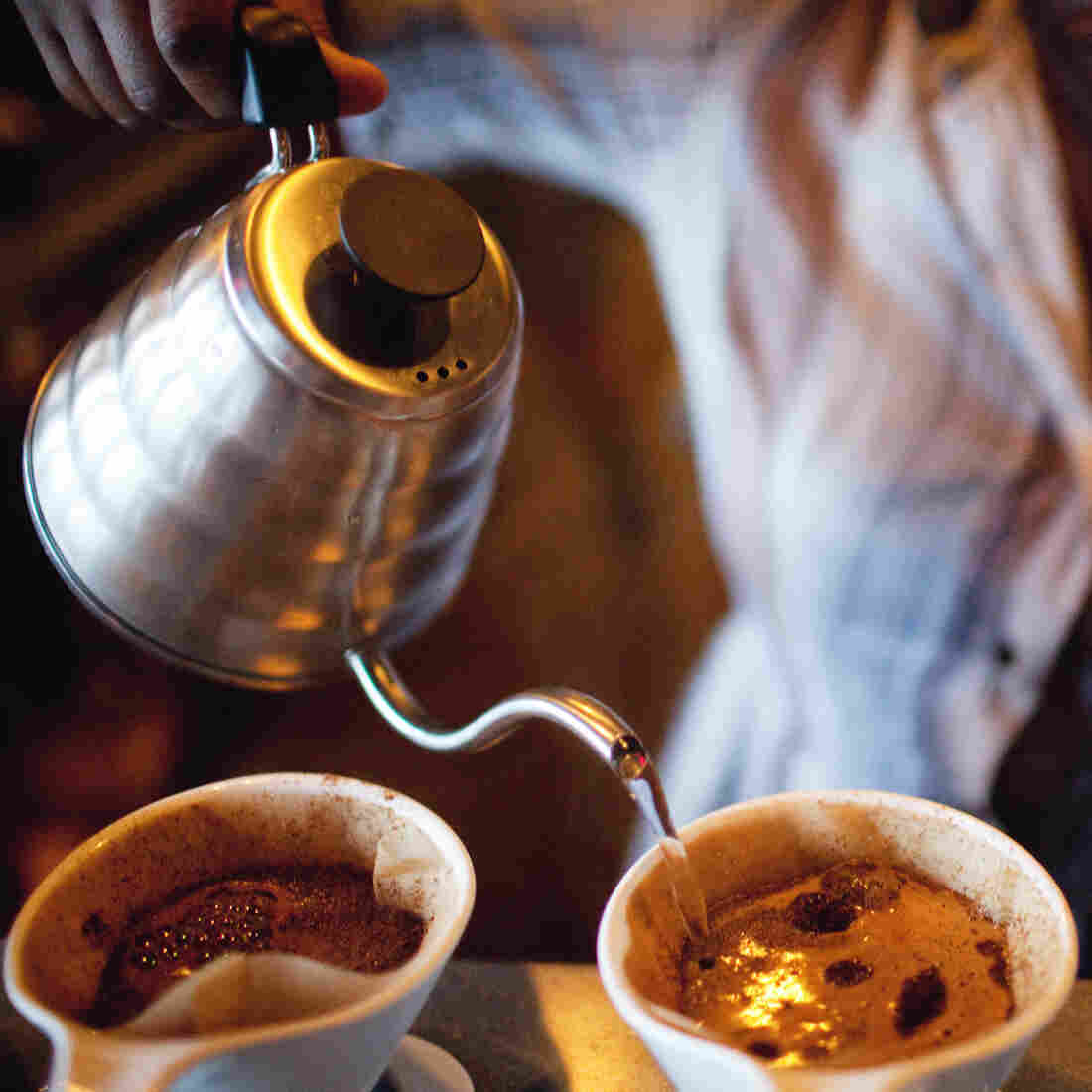 A barista makes coffee using the pour-over method at Artifact Coffee in Baltimore. A barista makes coffee using the pour-over method at Artifact Coffee in Baltimore.