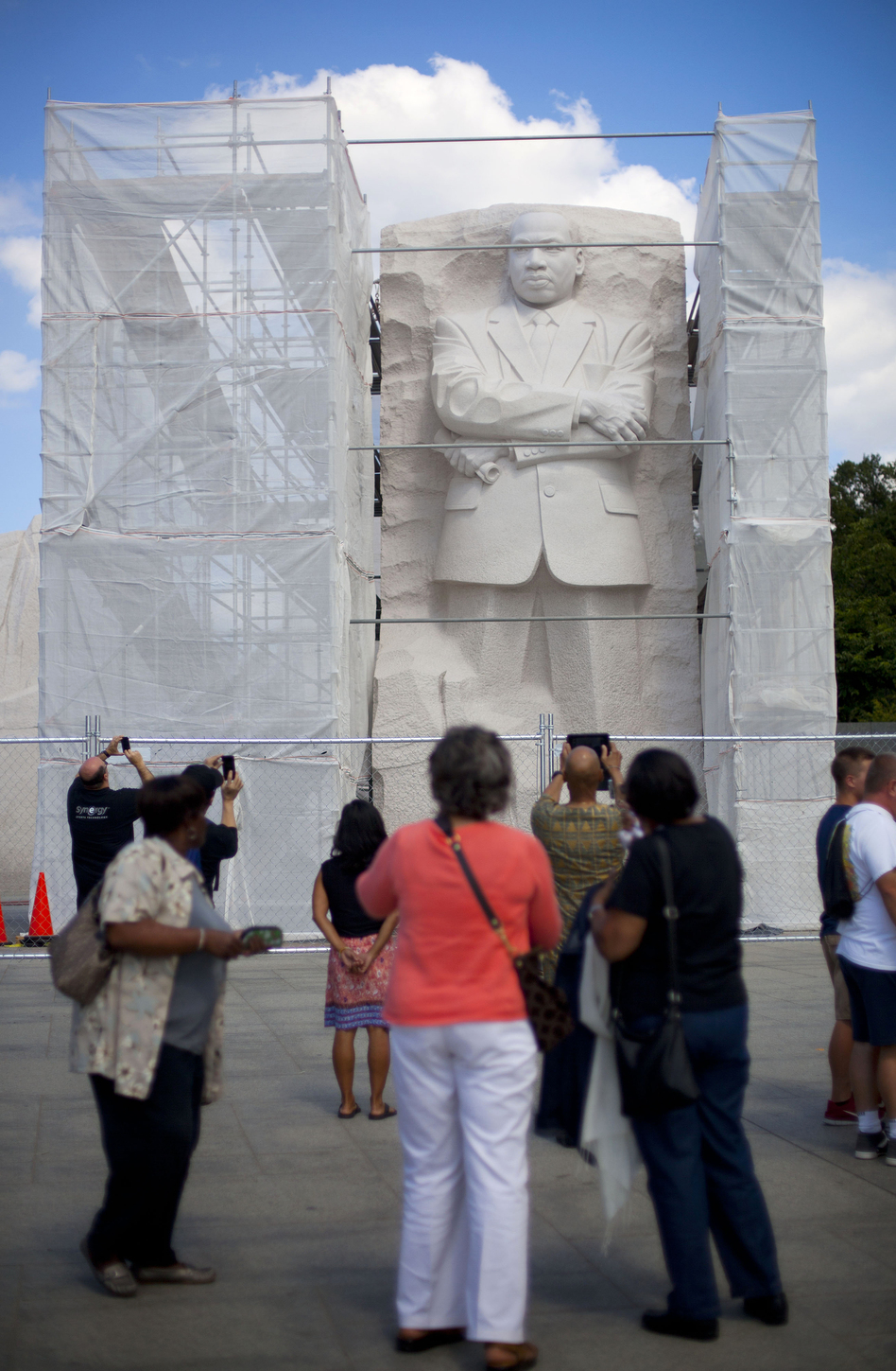<strong>Under Construction:</strong> A recent survey of Americans found that fewer than half believe the U.S. has made substantial progress toward racial equality. Here, the Martin Luther King Jr. Memorial in Washington, D.C., is boxed in by scaffolding as work is done on it. (Pablo Martinez Monsivais/AP)