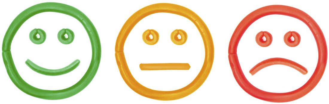 happy face emoji switches to blank face emoji (sad) 