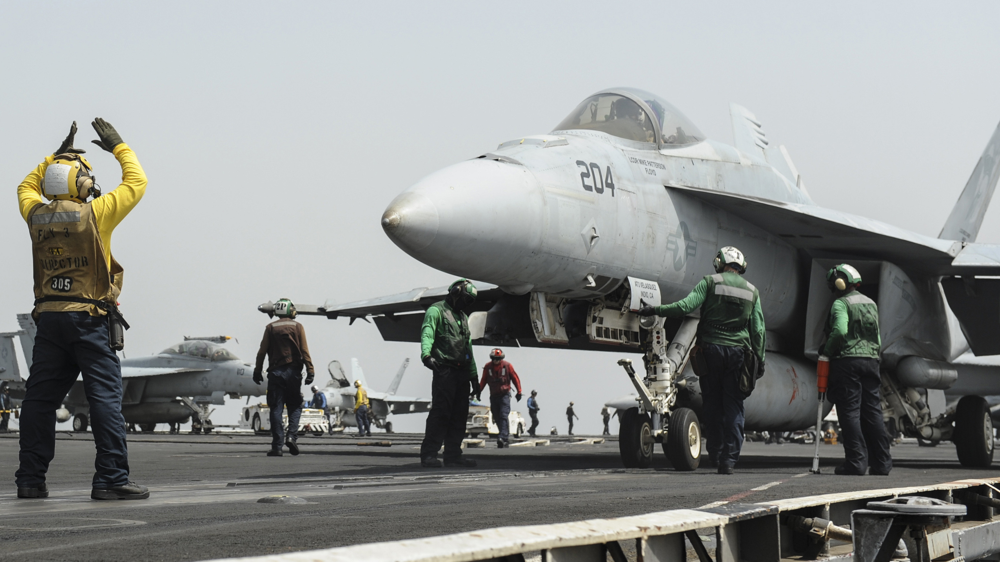 A U.S. Navy F/A-18F Super Hornet prepares to launch from the aircraft carrier USS Nimitz earlier this week in the Red Sea. The ship is among U.S. military assets in the region. (UPI/Landov)
