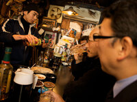 A Japanese micro-bar only has room for four customers at a time.