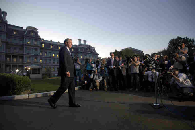 House Speaker John Boehner, R-Ohio, walks out of the White House to speak to members of the media after meeting with President Obama on Oct. 2.