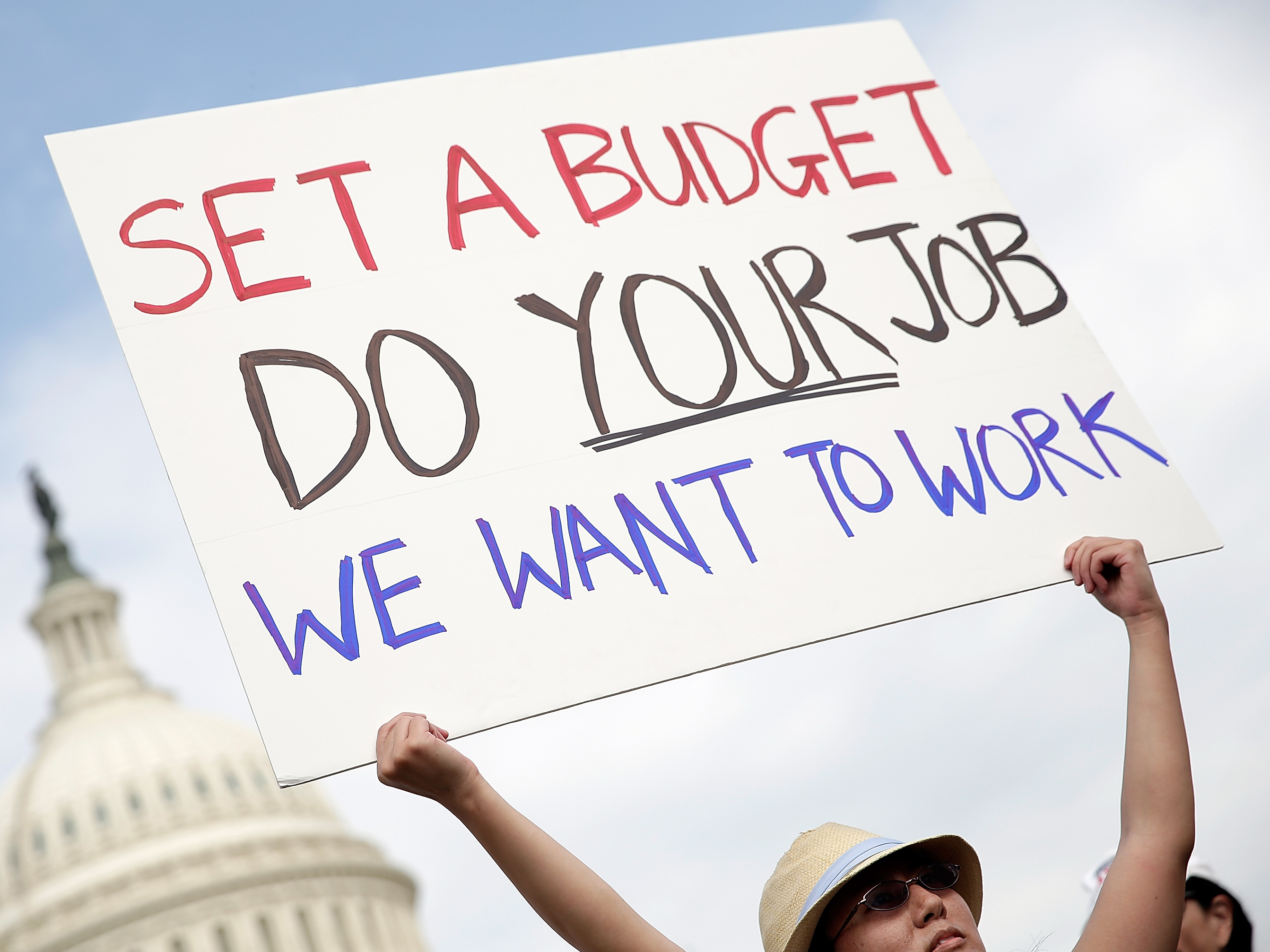 Federal Workers Head Back To Jobs As Government Reopens