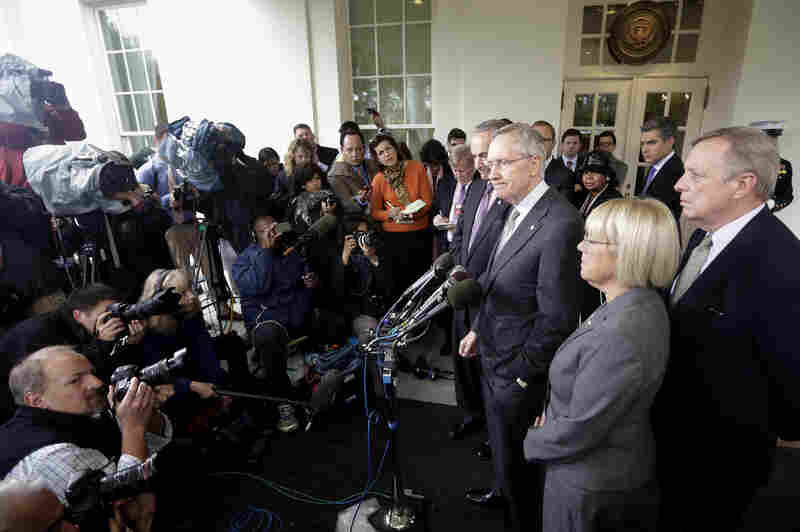 Senate Majority Leader Harry Reid, D-Nev., flanked by Sen. Charles Schumer, D-N.Y., Senate Budget Committee Chair Patty Murray, D-Wash., and Senate Majority Whip Richard Durbin, D-Ill., speaks to members of the media outside the West Wing of the White House on Oct. 10.