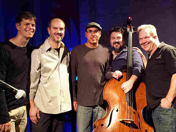 Alan Blackman (center) with his group.