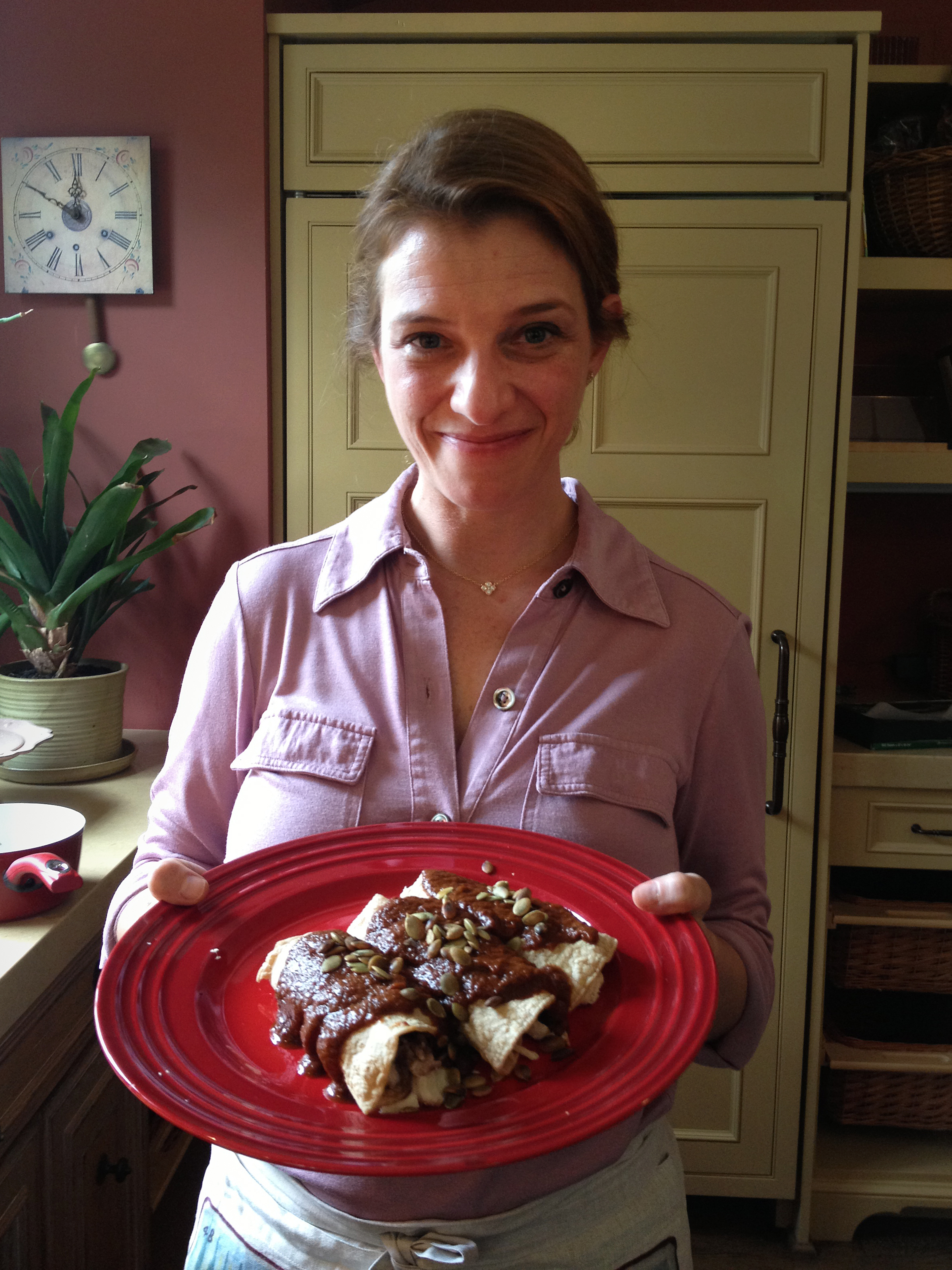 Author and food show personality Pati Jinich shows off her pumpkin and ancho chile mole. (Melissa Block/NPR)
