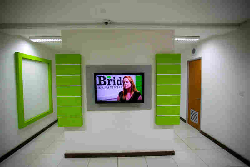 Bridge co-founder Shannon May on a video monitor in the company's Nairobi headquarters.