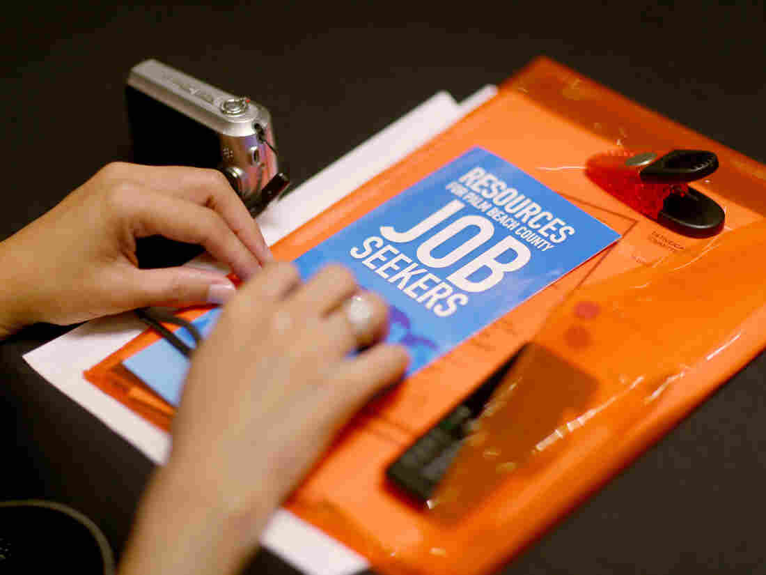 At a career fair in West Palm Beach, Fla., on Thursday, a job seeker collected information.